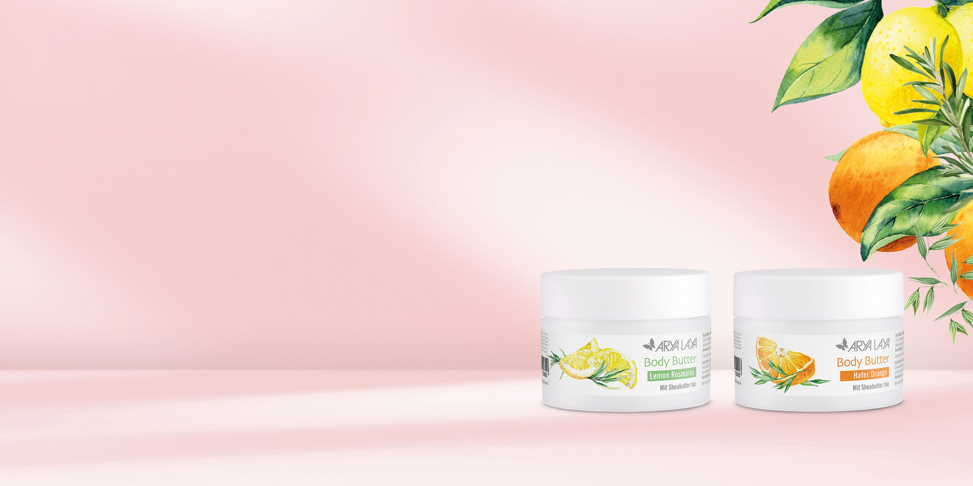 Body Butter Hafer Orange und Lemon Rosmarin  unter einem Zweig mit einer Orange und einer Zitrone