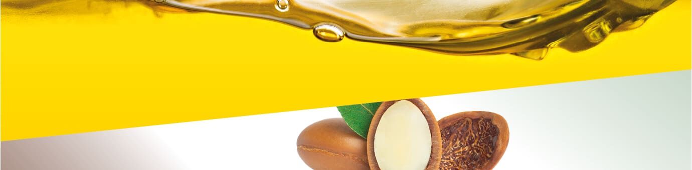 Argannüsse und Öl-Splash